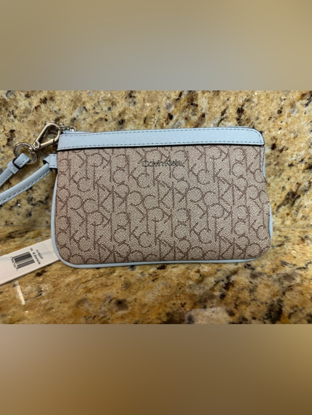 Calvin Klein Brown Monogram Wristlet with Light Blue Trim